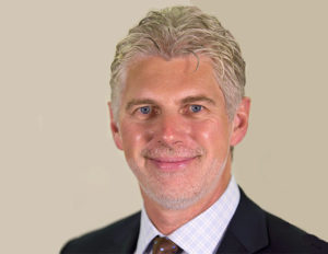 Tom-Axbey-president-and-CEO-of-Rave-Mobile-Safety